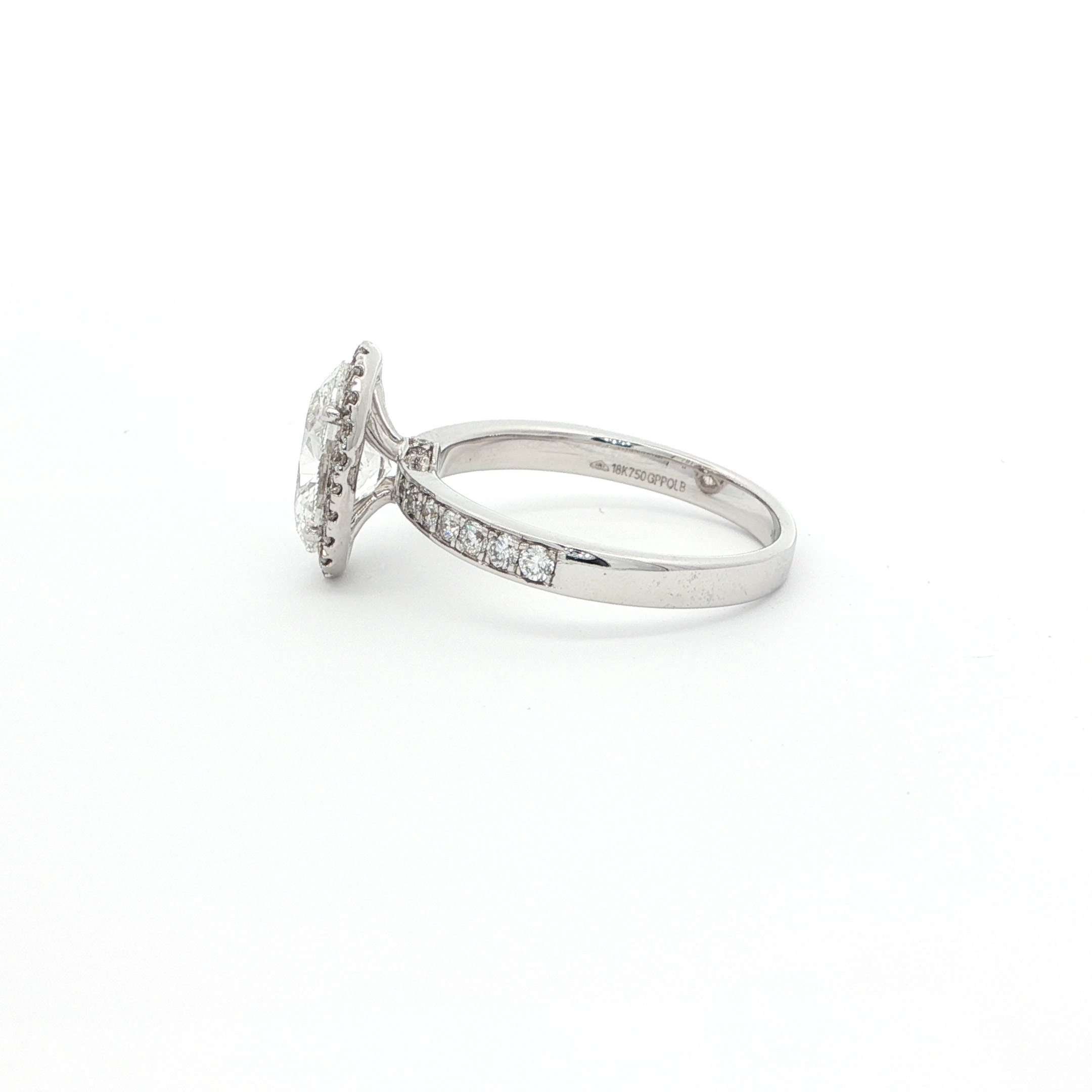 Half eternity oval diamond ring